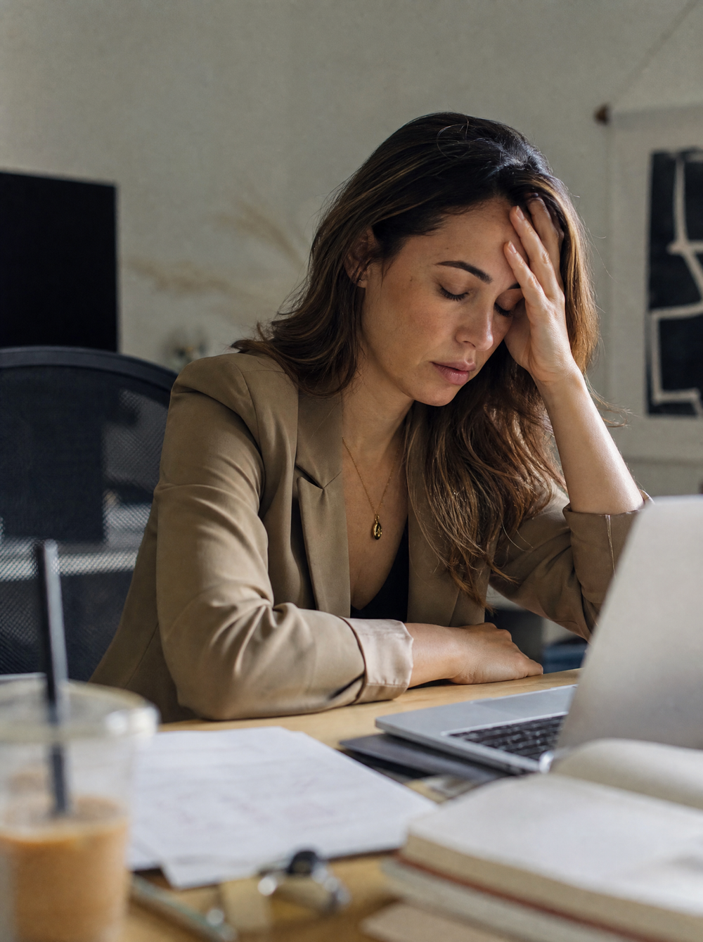 Woman at her desk in the afternoon slump